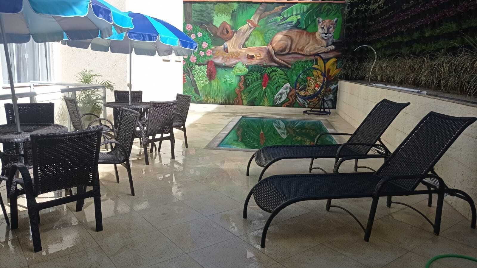 Outdoor pool, open 9:00 AM to 6:00 PM, pool umbrellas, pool loungers