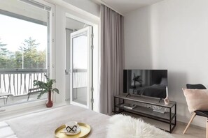 Desk, iron/ironing board - Modern and elegant studio next to Finnoo metro (Espoo)
