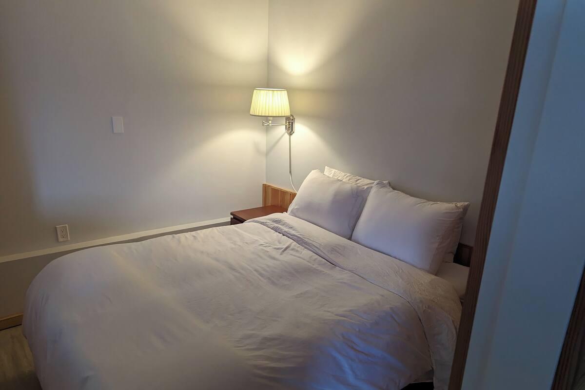 1 bedroom, desk, laptop workspace, iron/ironing board