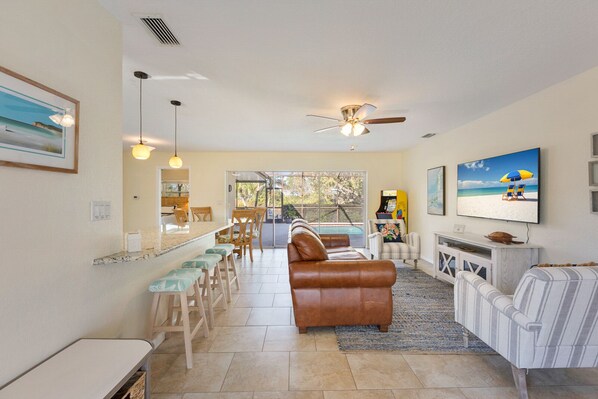 TV - Shore Lake on 88th—Waterfront Pool Home w/ Dock, Lanai, Fire Pit & Near Gulf Beaches (Seminole)