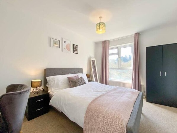 2 bedrooms, blackout curtains, iron/ironing board, free WiFi
