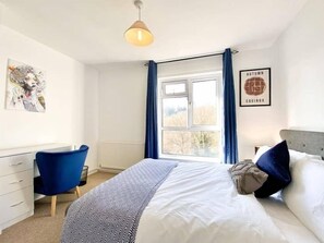 2 bedrooms, blackout curtains, iron/ironing board, free WiFi
