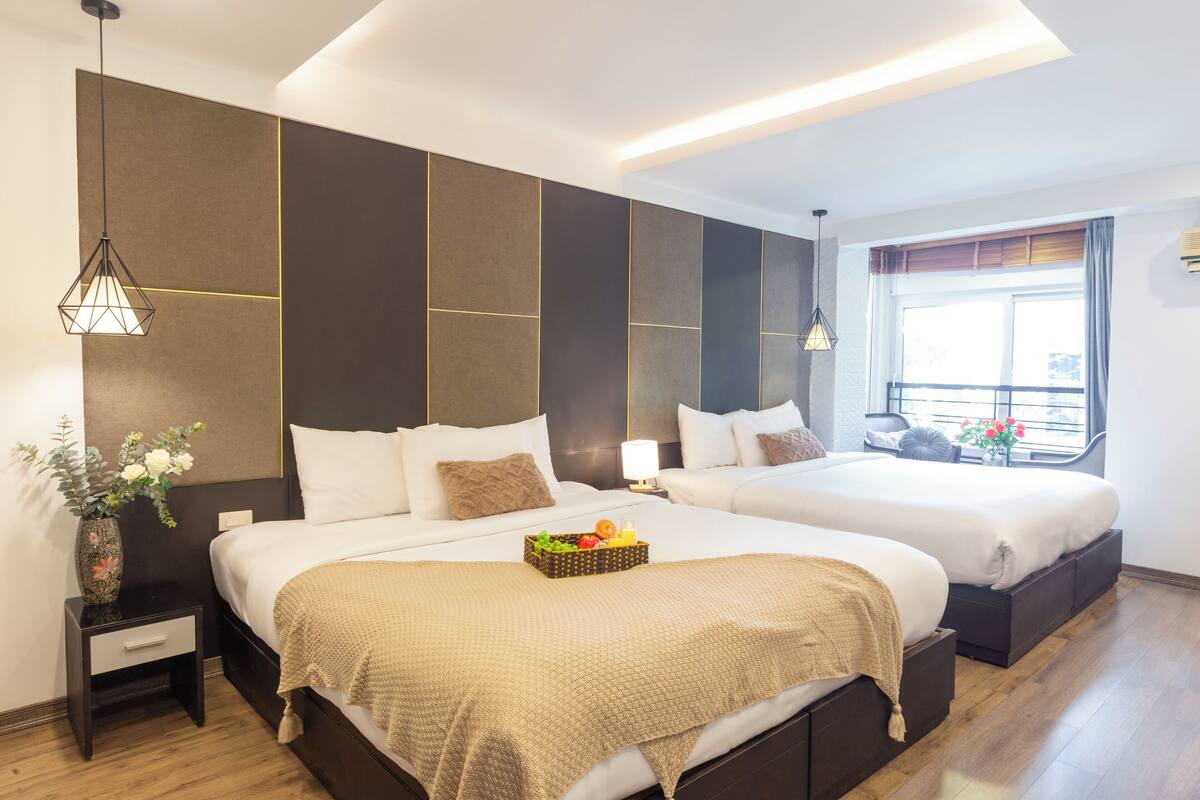City Quadruple Room, Multiple Beds, City View | Hypo-allergenic bedding available, down comforters, minibar