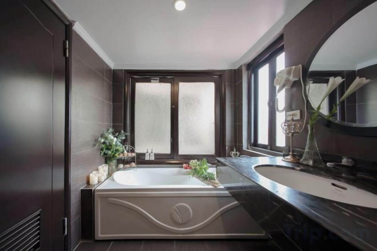 Bathroom | Designer toiletries, hair dryer, bathrobes, slippers