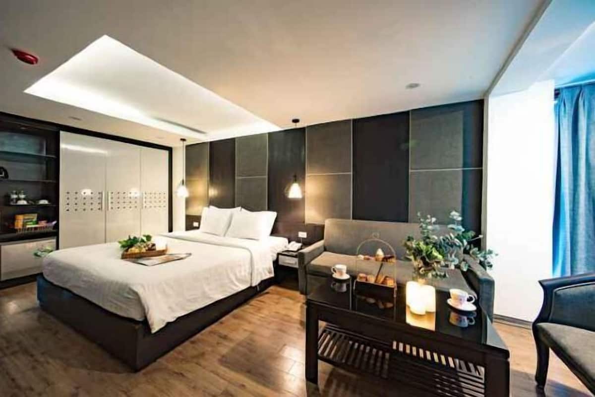 Bộ đồ giường kháng dị ứng, chăn bông, minibar, két bảo mật tại phòng
