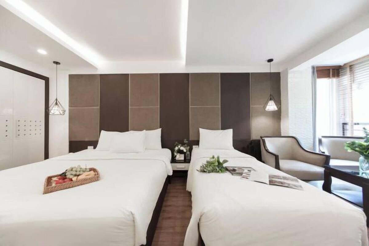Hypo-allergenic bedding available, down comforters, minibar