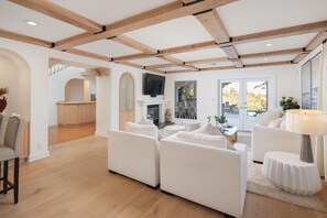 Luxury House, Multiple Beds, Pool Access, Pool View (Stradella Spanish) | Living area | 65-inch flat-screen TV with digital channels, TV, fireplace