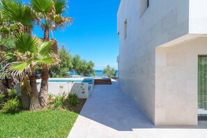 Property grounds - Brand new house on the beach with panoramic views and a pool (Son Serra de Marina)