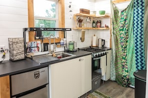 kitchen, propane stove and oven