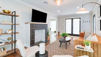 Smart TV, fireplace, books