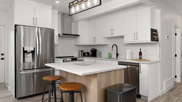 Coffee/tea maker, fridge, microwave, oven