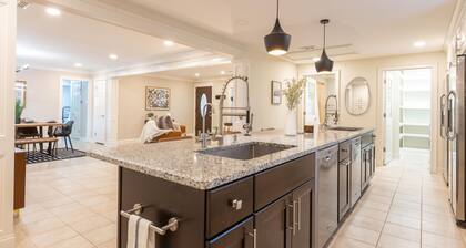 Updated home with chef's kitchen, open floorplan, and large yard