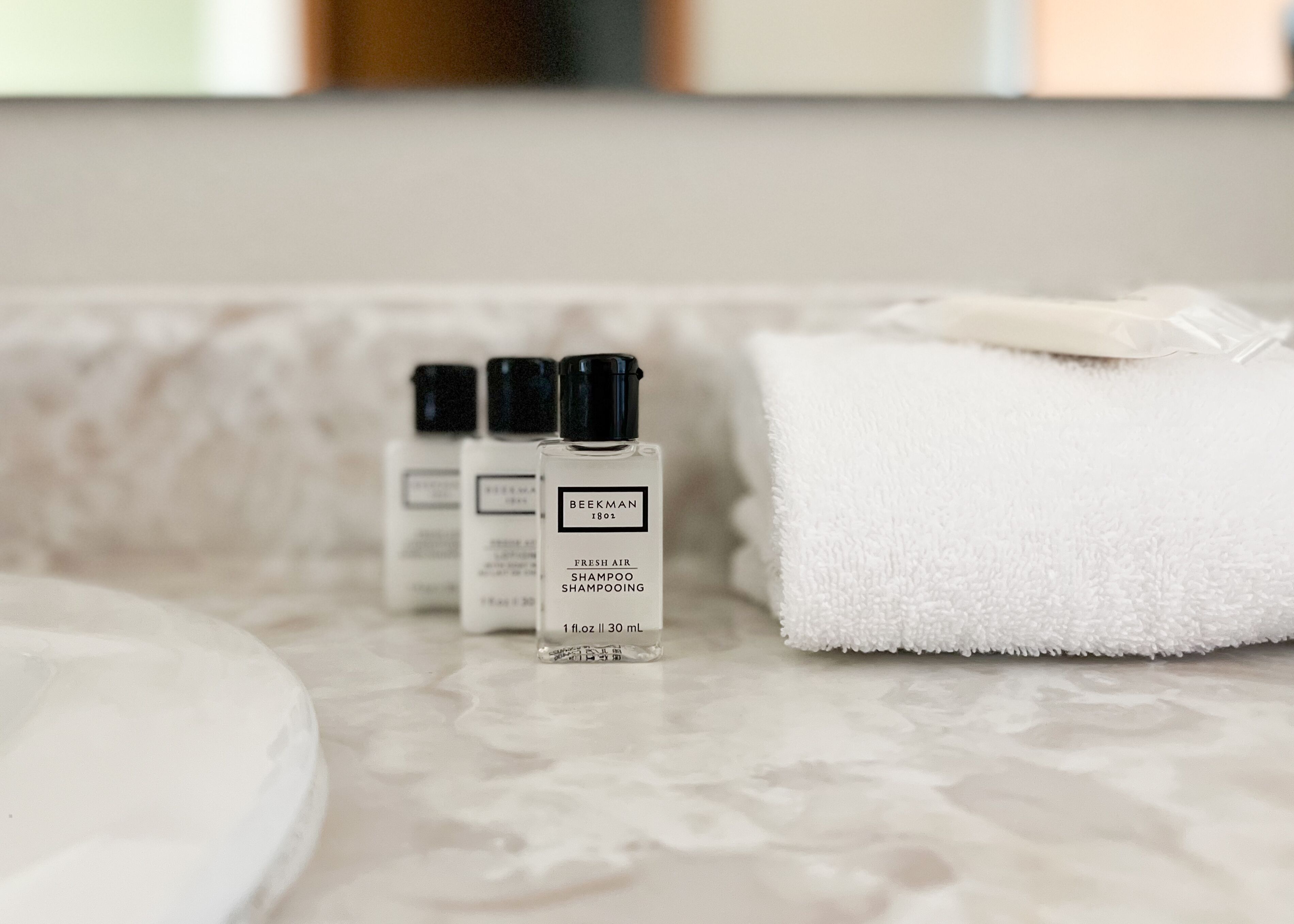 Combined shower/tub, designer toiletries, hair dryer, towels