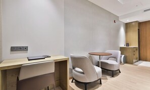 Suite Twin | Down comforters, individually decorated, individually furnished