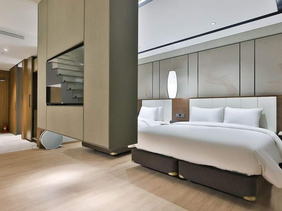 Suite Twin Rooftop | Down comforters, individually decorated, individually furnished