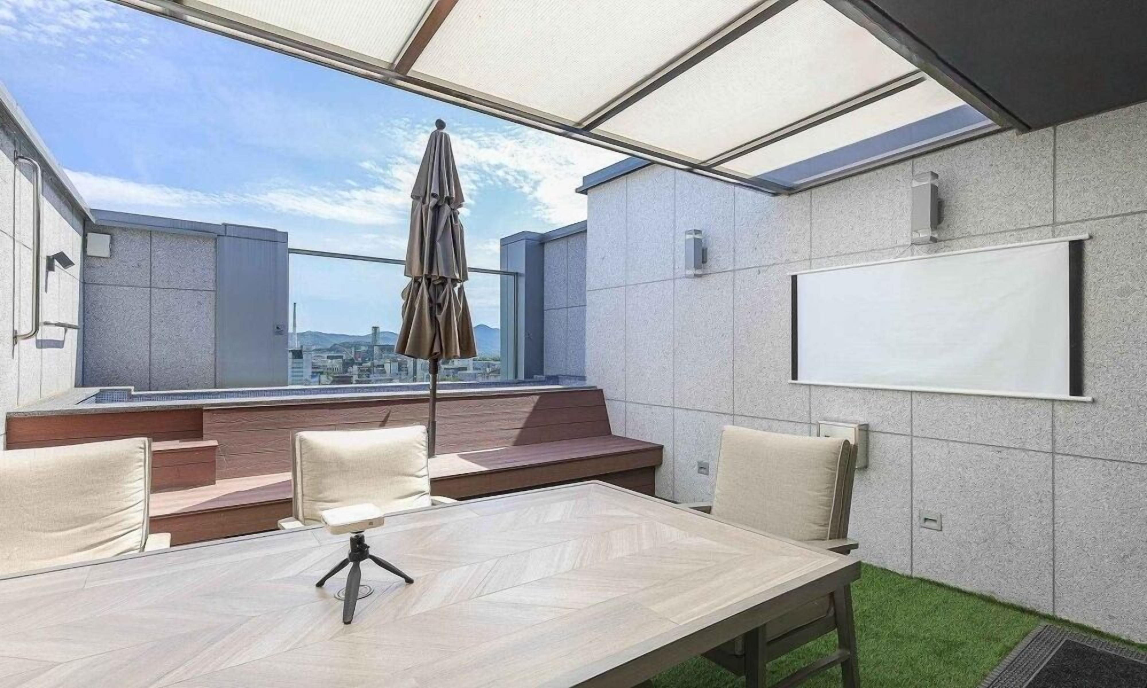 Suite Twin Rooftop | Down comforters, individually decorated, individually furnished