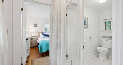 Across the road from Pemaquid Beach — quiet wooded king-bed cabin