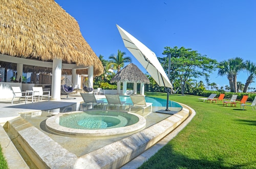 Tropical Golf View Villa. Steps to the ocean with a Gym and Theater-game room.  