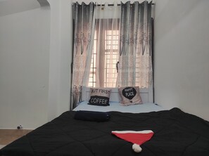Standard Room | Bed sheets - Homocation The Corporates Homestay (Guwahati)