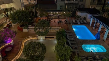 Outdoor pool, open 8:00 AM to 10:00 PM, cabanas (surcharge)