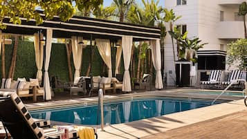 Outdoor pool, open 8:00 AM to 10:00 PM, pool cabanas (surcharge)