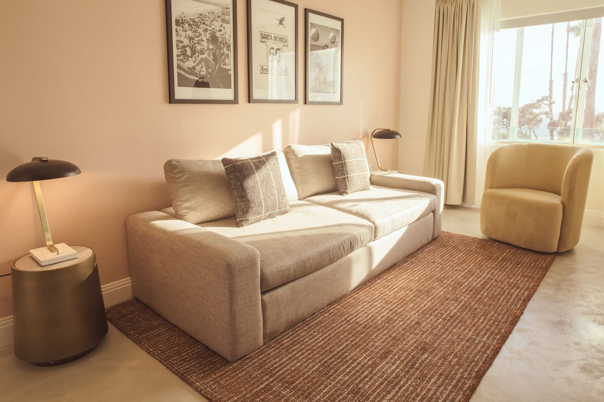 One Bedroom Ocean King Suite | Living area | 40-inch flat-screen TV with digital channels, TV, ping pong