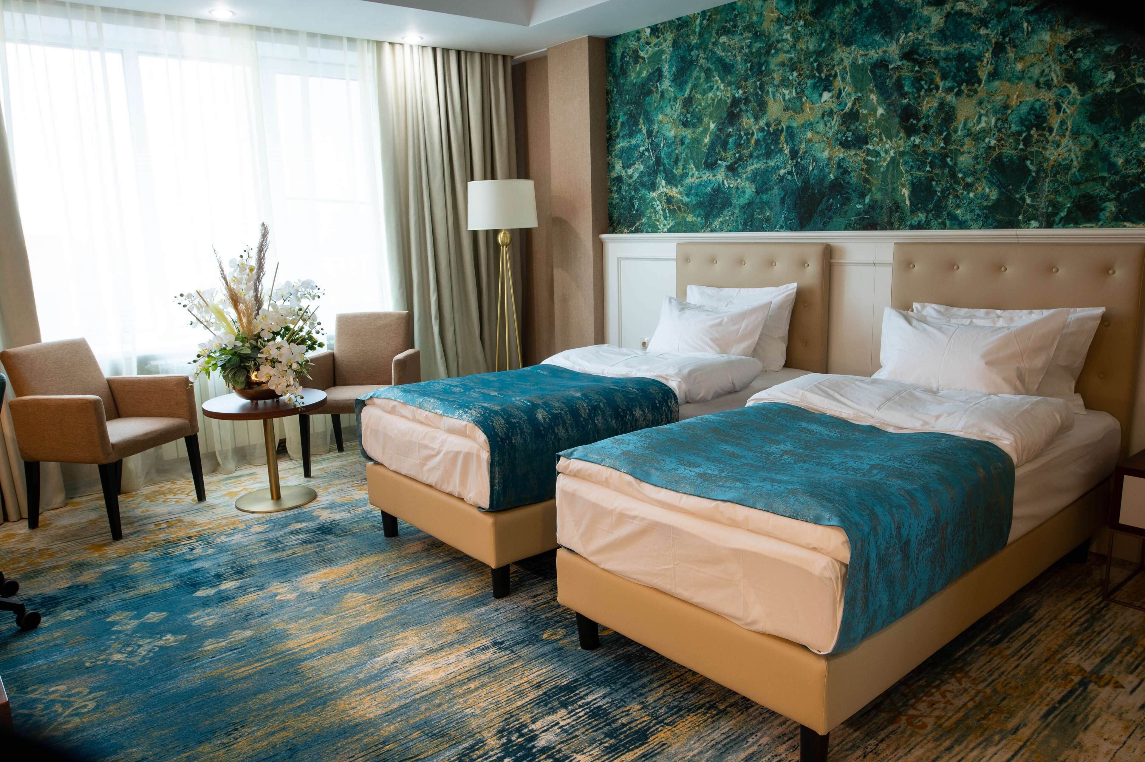Hypo-allergenic bedding, minibar, in-room safe, desk