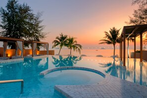 Outdoor pool, open 7:00 AM to 7:00 PM, free cabanas, pool umbrellas