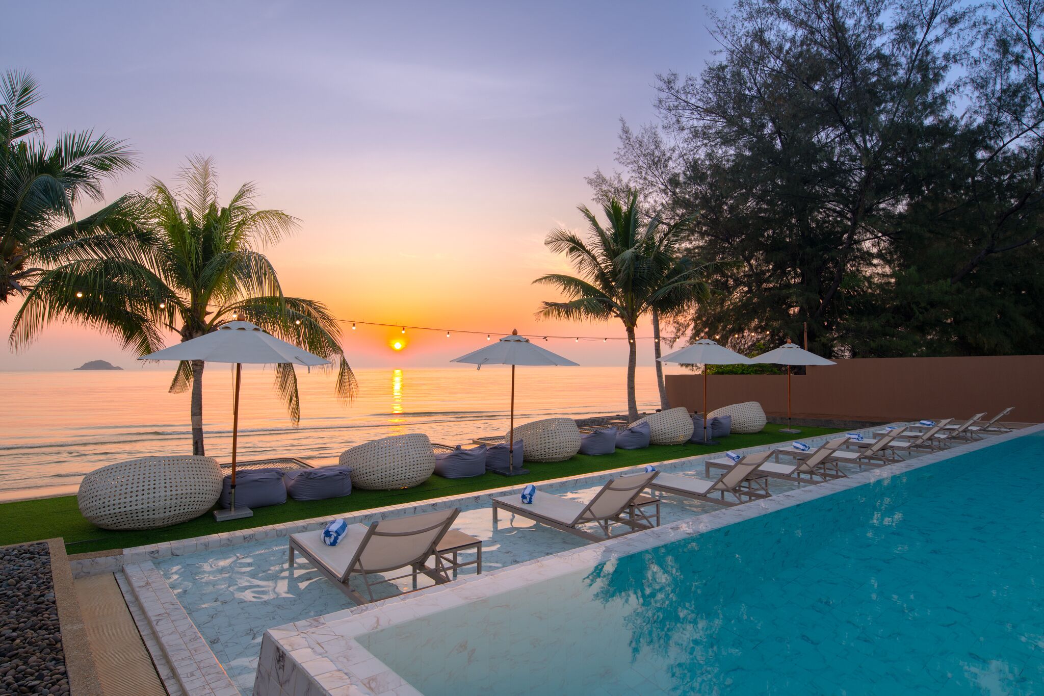 Outdoor pool, open 7:00 AM to 7:00 PM, free pool cabanas, pool umbrellas