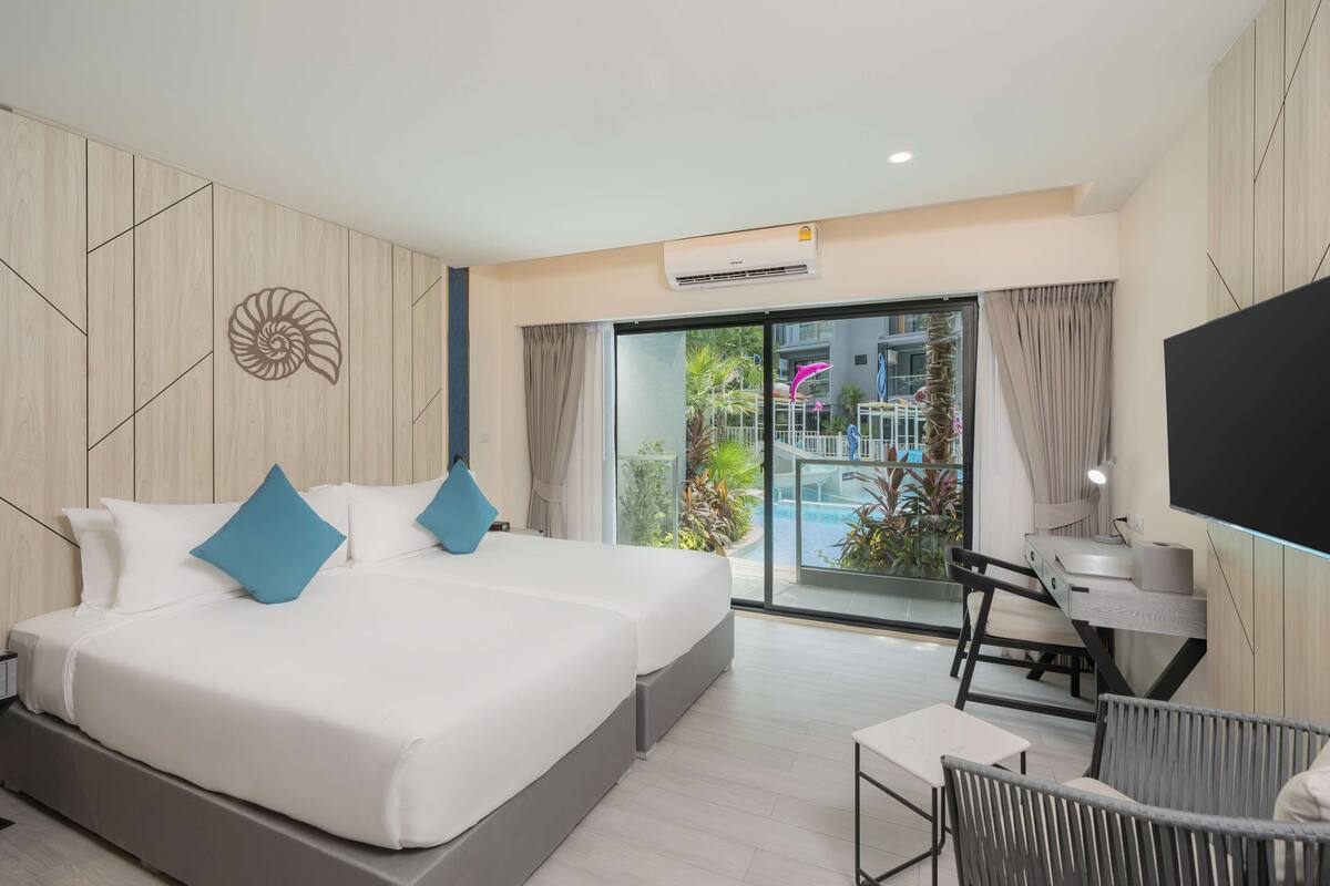 ห้องดีลัก ซ์, เตียงเดี่ยว 2 เตียง, ใช้สระว่ายน้ำได้ | เครื่องนอนระดับพรีเมียม, มินิบาร์, ตู้นิรภัยในห้องพัก, โต๊ะทำงาน