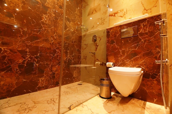 Shower, rainfall showerhead, designer toiletries, hair dryer