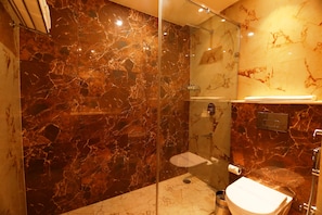 Shower, rainfall showerhead, designer toiletries, hair dryer