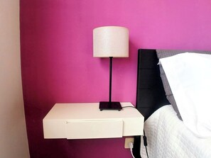 Bedside table and reading lamp beside the double bed - Apartment • Lisbon • 3BR • Walk to FIL and MeoArena (Lisboa)