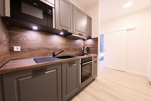 Studio Suite Keluarga | Seprai premium, kedap suara, dan Wi-Fi gratis