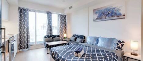 1 dormitorio, tabla de planchar con plancha, wifi gratis y ropa de cama