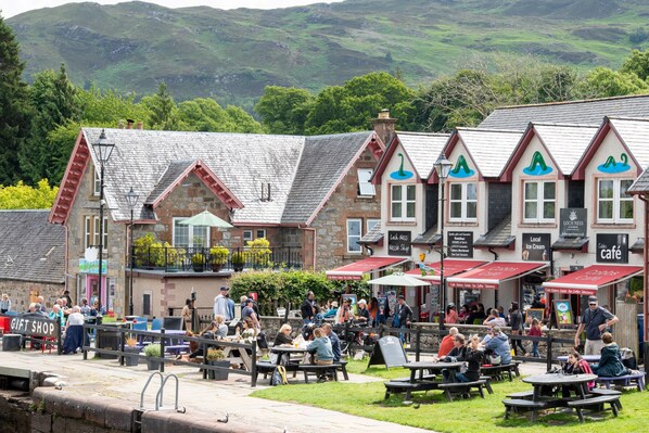 Enjoy a meal in our outdoor dining area surrounded by lush greenery and scenic hills.