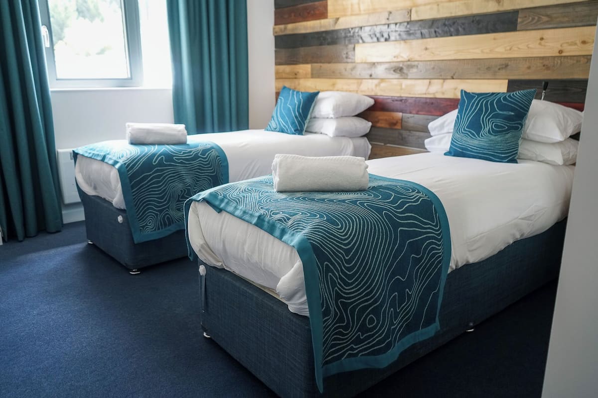 Doppel- oder Zweibettzimmer, Bergblick | Hochwertige Bettwaren, kostenloses WLAN, BettwƤsche