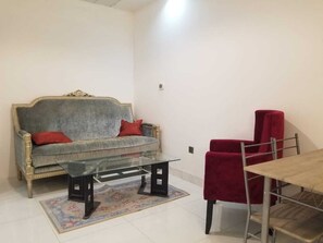 Luxury Villa, Multiple Bedrooms, Accessible, Pool View | Living area | 32-inch LCD TV with digital channels, TV - 2-bedroom Town House (Dubai)