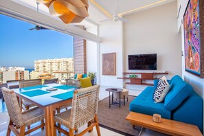Watch the smart TV from the comfort of the sofa or dining table