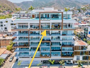 Located on the top floor, one level below the rooftop.