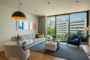 Superior Apartment, 2 Bedrooms | Living area | Flat-screen TV - Martinhal Lisbon Oriente (Lisbon)