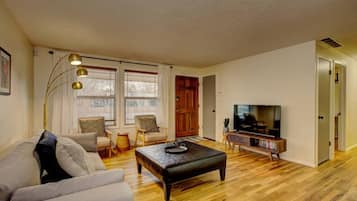 Smart TV, fireplace, books, offices