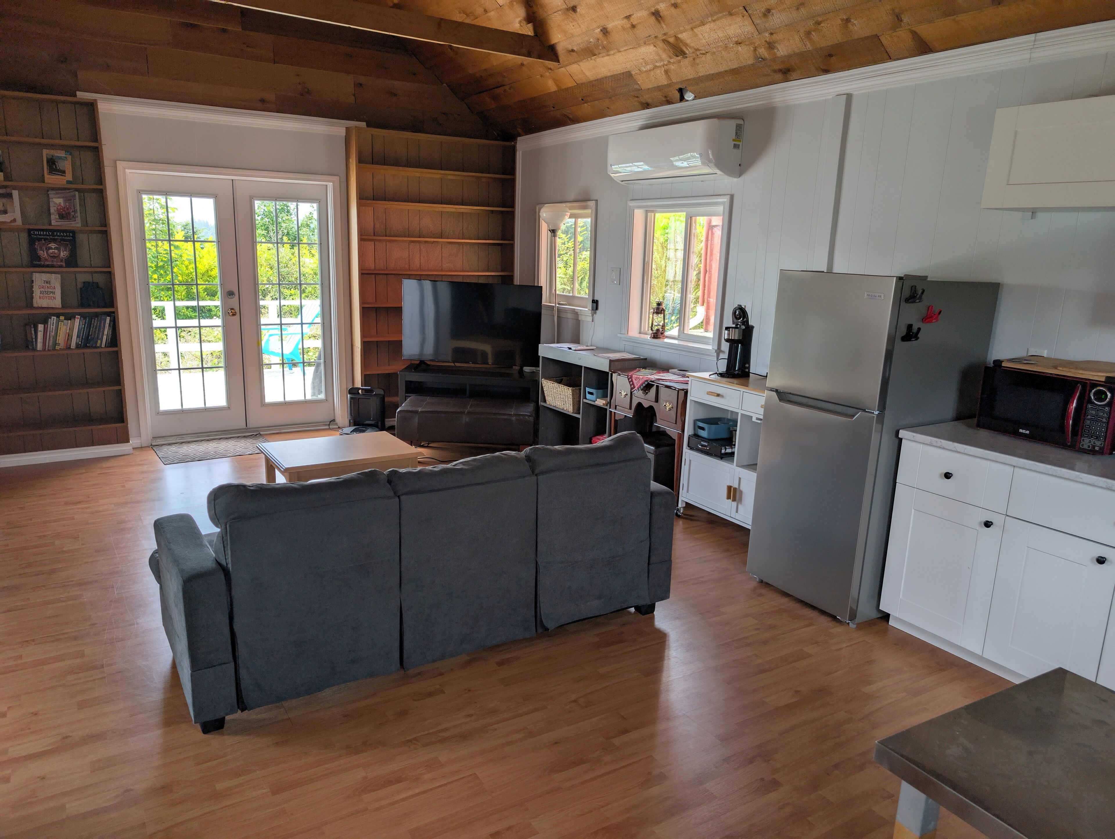 Panoramic Cabin, Bay View | Living area | 50-inch Smart TV with digital channels, streaming services