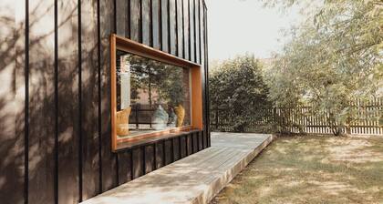 Modern wooden house on the Bodden with two apartments that can be combined