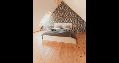 Modern wooden house on the Bodden with two apartments that can be combined