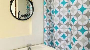 Shower, towels, soap, shampoo