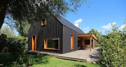 Modern wooden house on the Bodden with two apartments that can be combined