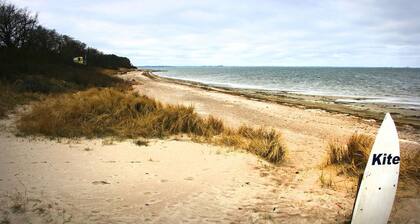 Modern wooden house on the Bodden with two apartments that can be combined