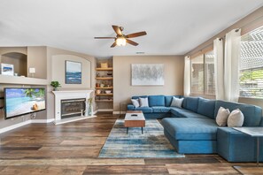 Smart TV, fireplace, books