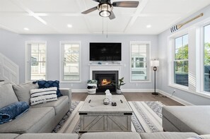 Smart TV, fireplace, foosball, books